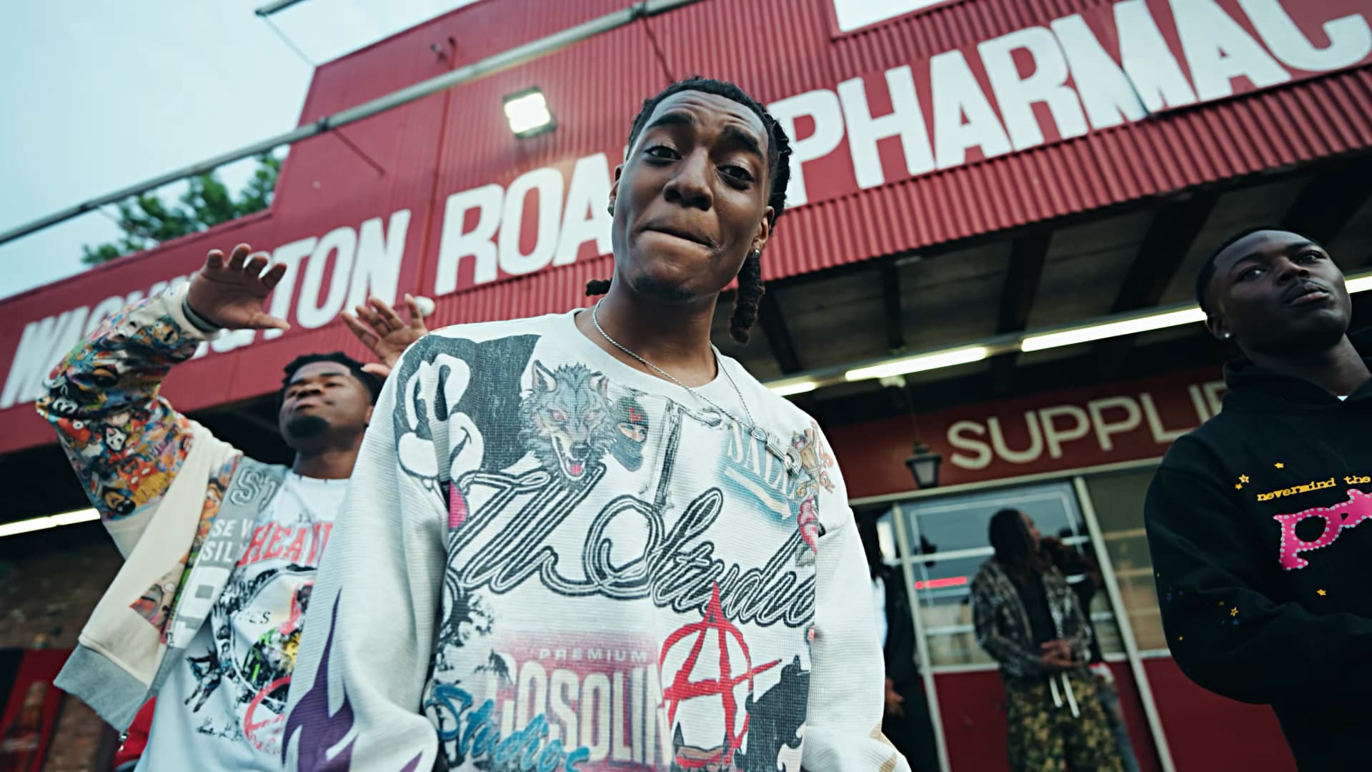 RW 5ive with friends outside a neighborhood store